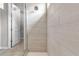 Glass-enclosed shower with tile walls and floors at 4869 Antrim Dr, Sarasota, FL 34240