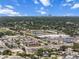 An aerial view captures the city skyline and a commercial district from above at 4920 69Th N St, St Petersburg, FL 33709