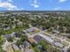 Aerial view of the neighborhood with a mix of residential and commercial properties at 4920 69Th N St, St Petersburg, FL 33709