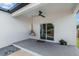 Covered back patio with a ceiling fan and view of the deck at 4920 69Th N St, St Petersburg, FL 33709