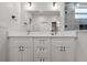 Bathroom featuring a double sink vanity with white countertop at 4920 69Th N St, St Petersburg, FL 33709