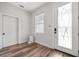 Bright entryway featuring wood floors and a sleek, modern aesthetic at 4920 69Th N St, St Petersburg, FL 33709