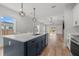 Bright kitchen view to Gathering room featuring island, stainless steel appliances and lots of natural light at 4920 69Th N St, St Petersburg, FL 33709