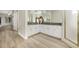 Bathroom featuring double sinks, granite countertops, and a glass shower at 5103 Twin Creeks Dr, Valrico, FL 33596