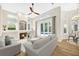 Cozy living room featuring a fireplace and access to an outdoor patio with a pool at 5103 Twin Creeks Dr, Valrico, FL 33596