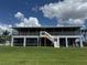 Spacious screened-in porch overlooking backyard and lawn with great views at 5111 Bay State Rd, Palmetto, FL 34221