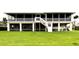Spacious screened porch overlooking lush green lawn at 5111 Bay State Rd, Palmetto, FL 34221