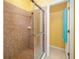 Bathroom shower with glass door at 5609 Spanish Point Ct, Palmetto, FL 34221