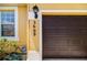 Exterior shot showing garage door and house number 5609 at 5609 Spanish Point Ct, Palmetto, FL 34221