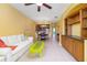 A view showing the living room, dining area, and kitchen at 5609 Spanish Point Ct, Palmetto, FL 34221