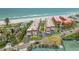 Aerial view of the beachside condo community with a pristine pool at 5806 Gulf Dr # 201, Holmes Beach, FL 34217