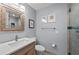 Updated bathroom featuring a modern vanity, stylish fixtures, and a glass-enclosed shower at 5806 Gulf Dr # 201, Holmes Beach, FL 34217