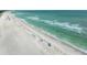 Picturesque beach with crystal-clear turquoise water and soft sand, perfect for sunbathing, swimming, and enjoying the coastal lifestyle at 5806 Gulf Dr # 201, Holmes Beach, FL 34217