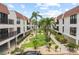 Beautiful beachside condos with well-manicured gardens and lawns at 5806 Gulf Dr # 201, Holmes Beach, FL 34217