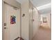 Hallway entrance to condo unit with carpet at 5806 Gulf Dr # 201, Holmes Beach, FL 34217