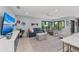 Living Room area featuring comfortable seating and a view to the balcony at 5806 Gulf Dr # 201, Holmes Beach, FL 34217