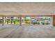 Covered parking area with well-maintained landscaping and convenient access to residential units, offering a secure parking solution at 5806 Gulf Dr # 201, Holmes Beach, FL 34217