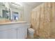Bathroom featuring a shower/tub combination and a white vanity at 590 Ridgewood Nw St, Port Charlotte, FL 33952
