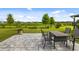 Enjoy the great backyard views from this patio with an outdoor dining set, perfect for entertaining at 5958 164Th E Ave, Parrish, FL 34219