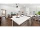 Open-concept layout features a spacious kitchen island and seamless transition to the living area at 5958 164Th E Ave, Parrish, FL 34219