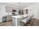 Beautiful kitchen boasts white countertops and modern gray cabinets, creating an elegant space at 5958 164Th E Ave, Parrish, FL 34219