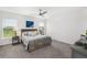 Spacious main bedroom featuring ensuite bathroom and a large window for natural light at 5958 164Th E Ave, Parrish, FL 34219