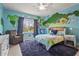bedroom featuring colorful themed wall art, window for natural light and sitting area at 6306 Anise Dr, Sarasota, FL 34238