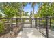 Community pet park entrance surrounded by greenery and secure fencing at 6306 Anise Dr, Sarasota, FL 34238