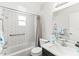 Bright bathroom with a shower/tub, subway tile, and modern sink at 643 Park Cir, Bradenton, FL 34207