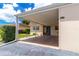 Exterior view showcasing the covered carport and home entrance, offering convenient parking and shelter at 643 Park Cir, Bradenton, FL 34207
