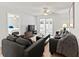 Inviting living room featuring neutral walls, plush seating, and sliding glass doors for natural light at 643 Park Cir, Bradenton, FL 34207