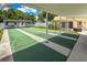Covered shuffleboard courts providing a recreational amenity for residents at 643 Park Cir, Bradenton, FL 34207