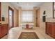 Beautiful bathroom with soaking tub, dual vanities, and walk-in shower at 7025 Saddle Creek Cir, Sarasota, FL 34241