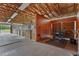 Spacious horse stable featuring multiple stalls and an area for equipment storage at 7025 Saddle Creek Cir, Sarasota, FL 34241