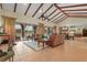 Spacious living room with high ceilings and access to the patio at 7025 Saddle Creek Cir, Sarasota, FL 34241