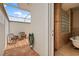 Beautiful brick patio featuring a relaxing sitting area with views of the shower and bath at 7025 Saddle Creek Cir, Sarasota, FL 34241
