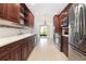The updated kitchen features stainless steel appliances and plenty of cabinet space at 7401 3Rd Nw Ave, Bradenton, FL 34209