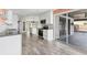 Well-appointed kitchen with modern appliances, ample cabinetry, and convenient access to the outdoor patio at 7442 N Leewynn Dr, Sarasota, FL 34240