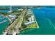 Breathtaking aerial view of waterfront condos offering stunning coastal scenery at 767 John Ringling Blvd # 25, Sarasota, FL 34236