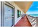 Spacious balcony with seating and stunning waterfront views at 767 John Ringling Blvd # 25, Sarasota, FL 34236