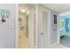 Hall bathroom with tiled walk-in shower adjacent to bedroom at 767 John Ringling Blvd # 25, Sarasota, FL 34236