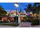 Charming night view of the Columbia Restaurant, showcasing its inviting ambiance and historic appeal at 767 John Ringling Blvd # 25, Sarasota, FL 34236