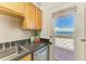 Kitchen features granite counters, stainless appliances and view of the ocean at 767 John Ringling Blvd # 25, Sarasota, FL 34236