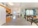 Open kitchen boasts granite counters and is adjacent to living room with amazing views at 767 John Ringling Blvd # 25, Sarasota, FL 34236