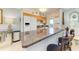 Charming kitchen features granite counters, wood cabinets, and stainless steel appliances at 767 John Ringling Blvd # 25, Sarasota, FL 34236