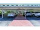 Covered parking area with designated parking spots and easy access to building entrances at 767 John Ringling Blvd # 25, Sarasota, FL 34236