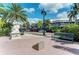 Charming street view with the Columbia Restaurant and lush greenery, enhancing the neighborhood's appeal at 767 John Ringling Blvd # 25, Sarasota, FL 34236