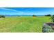 View of grass area overlooking bay at 767 John Ringling Blvd # 25, Sarasota, FL 34236