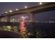 Stunning water view at night featuring bridge lights and fireworks, promising an exciting lifestyle at 767 John Ringling Blvd # 25, Sarasota, FL 34236