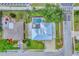 Birds-eye view showcasing the home's layout, in-ground pool, and well-manicured landscaping in a desirable neighborhood at 7727 9Th Avenue Nw Dr, Bradenton, FL 34209